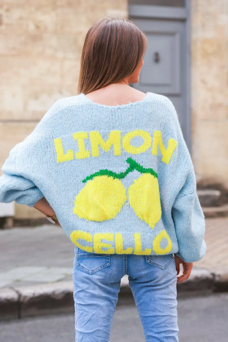 Gilet bleu ciel en grosse maille et gros boutons citron limoncello au dos